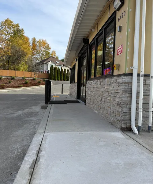 Sidewalk and curb gutter repair in Shell Gas Station in Newcastle 